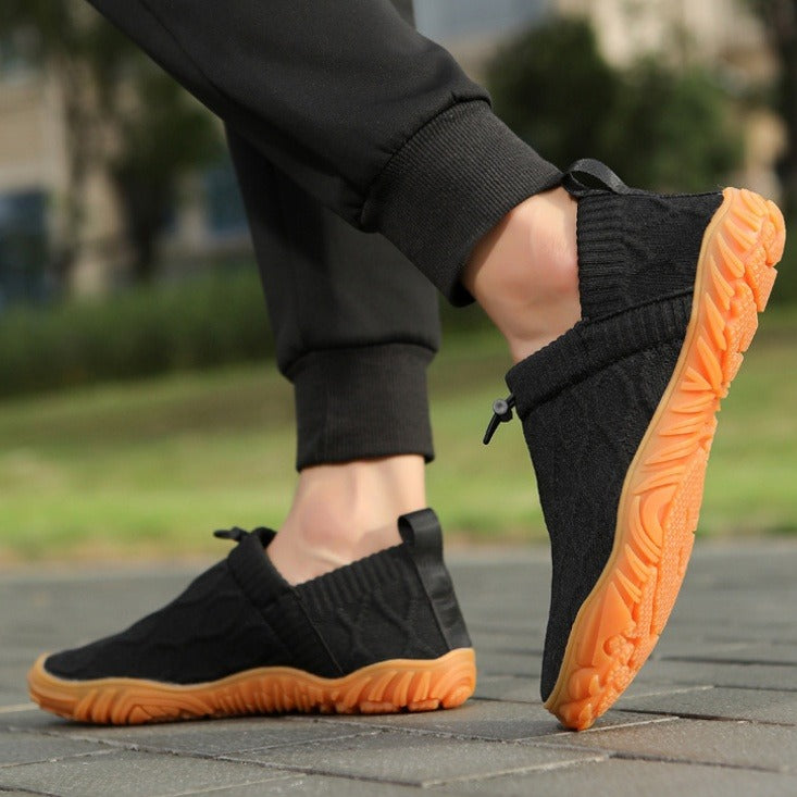Black Aura barefoot shoes, lightweight and wide toe for natural movement.