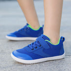 Blue children's barefoot shoes, these Barefoot Sprint shoes are light weight  and built for comfort.