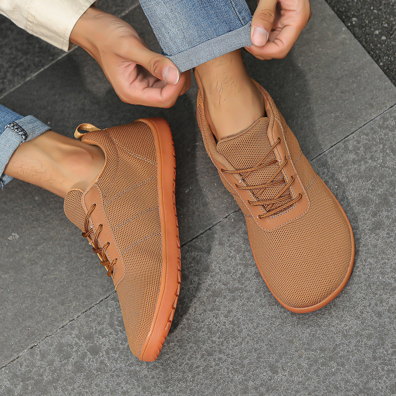 Brown Barefoot Urban shoes with brown laces and soles with wide toe for natural comfort and foot pain relief.