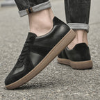 Black Loafers with brown soles, made with elegant leather material for perfect comfort and quality
