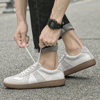 White Monaco loafers made with leather material and a brown sole for maximum comfort.