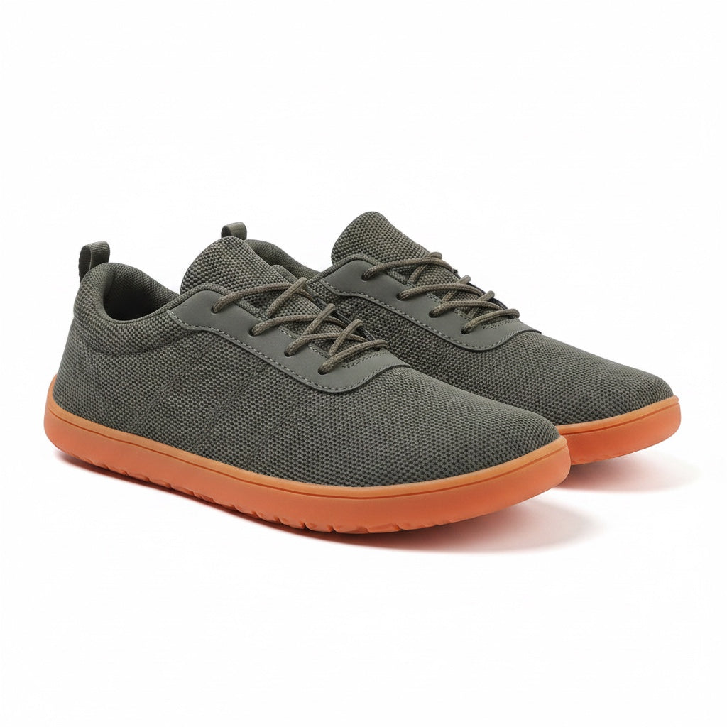 Green mens barefoot shoes with an orange sole. These Urban barefoot shoes have wide toe with a knit elegant finish. 