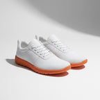 Barefoot knit shoes with a orange sole. These Urban barefoot shoes are light, have a wide toe and have an amazing knit textile finish.