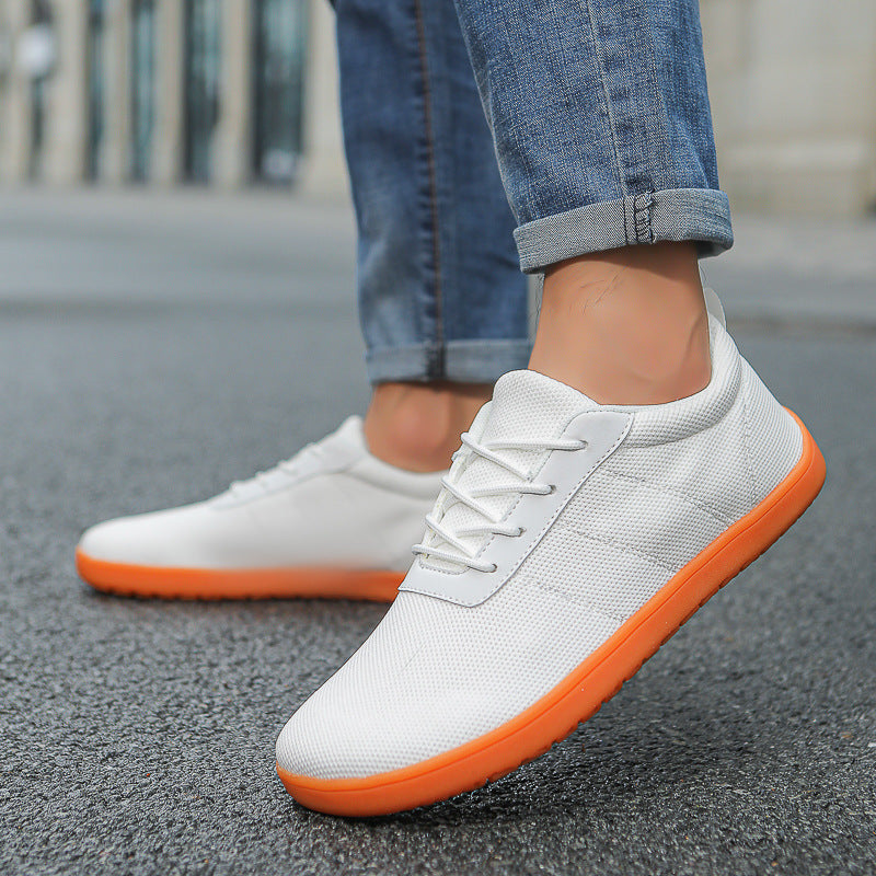 White knit Urban barefoot shoes with an orange sole. these have wide toe for maximum comfort perfect for shopping days or socialising 